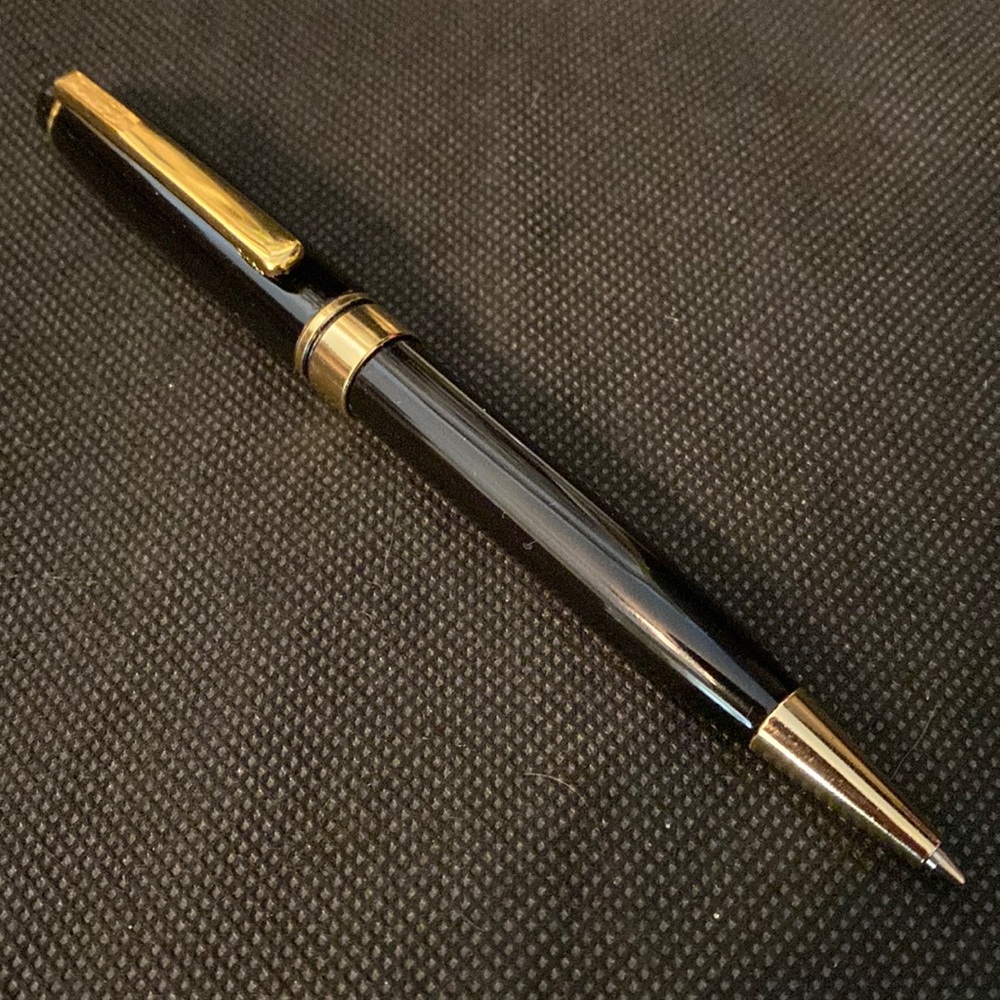 Vintage Heavy random Black and gold ball point pen